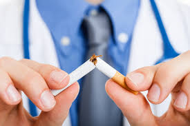 Close-up of a doctor breaking a cigarette in half